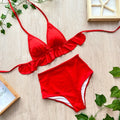 TRIANGULO CON BOLERO ROJO